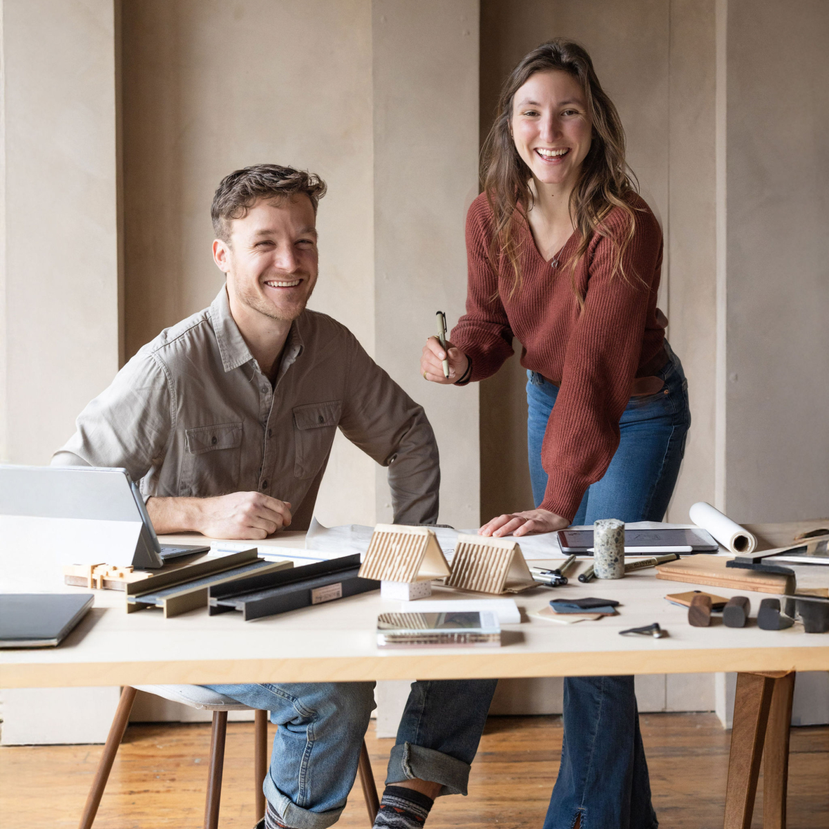 Portrait of Julia and Stone, principals of Refine Design Architecture, photographed indoors in a natural, understated setting that reflects their collaborative residential practice focused on site-conscious, concept-driven design and thoughtful architectural work.